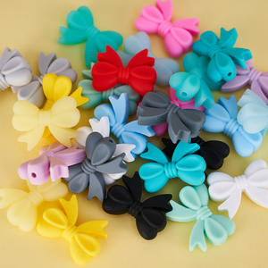 2024 vente chaude Bowknot forme perle à mâcher bricolage sucette chaînes accessoires sans BPA bébé Silicone perles focales - Product Image 1