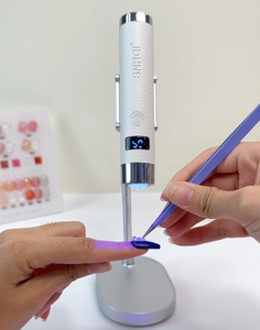 SNRQI <span class=keywords><strong>2026</strong></span> Neuheiten G1 KI-Nagellampe Großhandel KI-Sensor UV-<span class=keywords><strong>LED</strong></span>-Nagellampe 2 Timer Magnetischer Rotationsständer 1H Kabellose UV-Lampe - Product Image 1