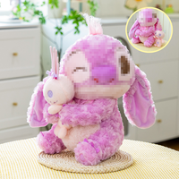 Nouvelle peluche Stitch Sakura, adorable peluche douce de dessin animé, Stitch violet tenant un petit monstre, peluche Stitch en velours, jouets en peluche