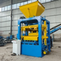 Machine automatique de fabrication de blocs creux en ciment XIANGLONG 4-26 avec moteur hydraulique et moteur 380V