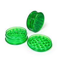 Kundenspezifisches Logo 60mm Tragbarer Kunststoff Kräuter- & Tabak-Grinder Mini Kleiner Trockengewürz-Mühle Spiegel-Technik Großhandel Rauchpfeifen