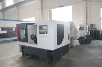 Tour CNC à banc incliné haute précision TCK4558, centre de tournage CNC à tourelle automatique pour le traitement des pièces métalliques