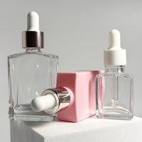 Flacon compte-gouttes carré en verre de 15 ml et 30 ml pour huiles essentielles avec bouchon à vis, emballé en carton, pour sérum de soin, crème pour le visage, crème pour les yeux, et gouttes pour les yeux