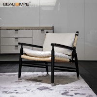Fauteuil de détente minimaliste haut de gamme en rotin tressé, bois de frêne noir minuit, tissu écologique, pour villa de luxe, salon et chambre