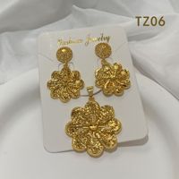 Parure de bijoux vintage étanche anti-ternissement en cuivre plaqué or avec pendentif filigrane et boucles d'oreilles pour femme