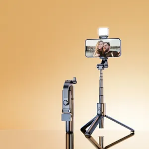 Fabrika toptan mini canlı tripod kablosuz selfie sopa esnek aydınlık cep telefon standı