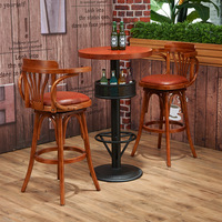 Ensemble de table et de chaises de bar en bois massif de style américain vintage avec accoudoirs pivotants et dossier, chaise de bar haute pour usage commercial