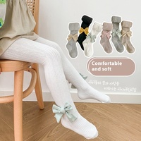 Vente en gros de leggings ras du cou pour enfants combinaison avec nœud de couleur unie et motif papillon printemps automne chaussettes pour bébés pour filles