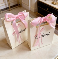 Luxury Paperboard Gift Bag with Gold Edge Recycled Materials Portable Jewelry Wedding Gift Packaging with Bow Ribbon