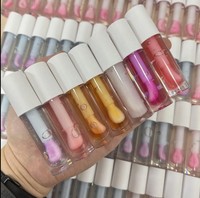Huile à lèvres repulpante hydratante en profondeur, scintillante, au goût fruité, en pot blanc, cosmétique à marque privée