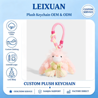 Breloque de sac lapin rose mignon et moelleux avec nœud en ruban vert camélia, cordon de poignet en paracorde rayé rose, porte-clés pour filles