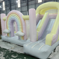 Château sautant arc-en-ciel en PVC de fête avec certificat CE Maison de rebond arc-en-ciel Videur gonflable avec toboggan pour enfants