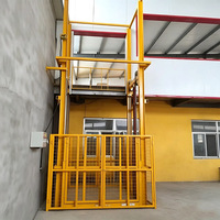 Plateforme élévatrice verticale fixe sur mesure avec abaissement d'urgence, élévateur de marchandises hydraulique intérieur.