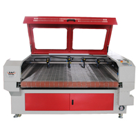 Machine automatique à couper les semelles de chaussures et de pantoufles à 4 têtes laser avec dispositif d'alimentation automatique pour les supports en caoutchouc Format AI et BMP