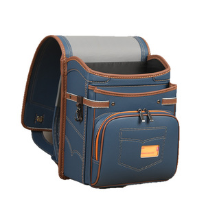 Sac à dos d'école primaire en jean à fermeture automatique, léger, protection de la colonne vertébrale, sac à dos double épaule unisexe bleu pour enfants - Product Image 4