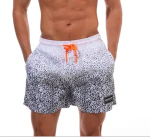 Venta caliente de los hombres casuales de deporte sublimado de secado rápido de la playa pantalones cortos de hombres