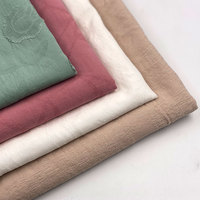 Forme irrégulière jacquard prêt stock tissu bas quantité minimale de commande uni teint tissu 100% coton dobby tissu pour robe chemise