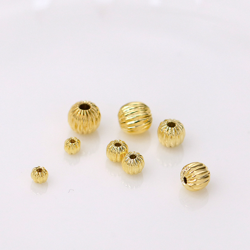 Perles de citrouille rayées en or véritable 14 carats
