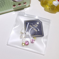 Petit emballage de bijoux personnalisé sac en plastique zippé sac à fermeture éclair mignon mat pour boucle d'oreille logo réutilisable mini pochette à zip-lock en PVC