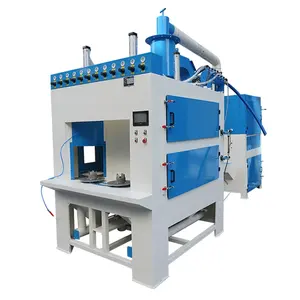 Automatic rotating table sand blasting machine for batch cylindrical shape parts