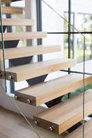 Escalier en acier artistique flottant, escalier moderne en métal cantilever pour villa