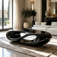 Table basse ovale sculpturale en fibre de verre noire brillante, design monobloc pour espace de vie résidentiel moderne et luxueux