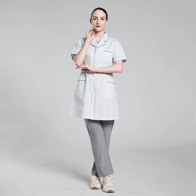 Vendita calda alla moda infermiera bianca uniforme uniforme da infermiere blu Navy in ospedale