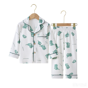 Set <span class=keywords><strong>pigiama</strong></span> per bambini in cotone Guai <span class=keywords><strong>con</strong></span> stampa di <span class=keywords><strong>dinosauri</strong></span> e top <span class=keywords><strong>con</strong></span> bottoni per un comodo <span class=keywords><strong>pigiama</strong></span> e coordinato per la famiglia - Product Image 2