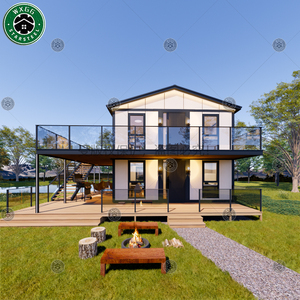 Moderna casa modular prefabricada de dos pisos en acero ligero, tipo resort villa, con balcón con barandilla de vidrio y terraza exterior. - Product Image 3