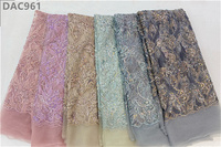 Vente en gros de tissu textile en polyester à sequins en maille, dentelle perlée, dentelle élastique de luxe, broderie de perles cordées