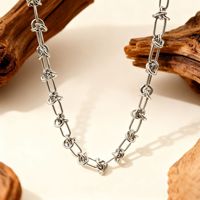 Ensemble collier et bracelet en acier titane style épines Hip Hop Punk, tendance intemporelle, chaîne de clavicule simple, vente en gros