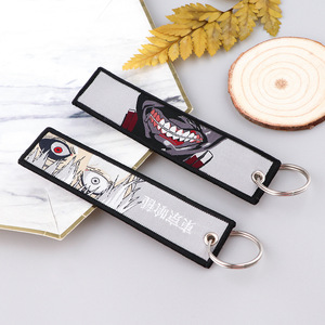 พวงกุญแจผ้าลายอนิเมะวอลเลย์บอล โทเกียว โกลด์ พร้อมจี้ใบโคลเวอร์สี่แฉก - Product Image 3