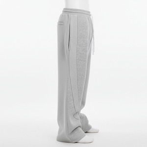 2026 Vente en gros Pantalon de jogging streetwear pour <span class=keywords><strong>homme</strong></span> en coton, coupe oversize ample, jambe large, avec logo personnalisé et bandes latérales superposées - Product Image 5