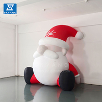 Décoration extérieure gonflable de Noël personnalisé faire sauter énorme grande barbe gonflable assis père noël pour décor de cour