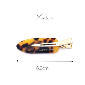 Xinmei ที่หนีบผมอะซิเตทแบบไม่โค้งงอไม่มีรอยพับผมแบบไร้รอยต่อพร้อมโลโก้ - Product Image 5