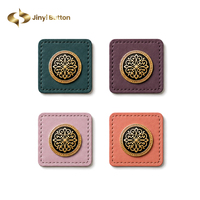 Écusson en cuir personnalisé Jinyi avec logo de marque, bordure cousue, structure de couture, OEM ODM, pour hijab