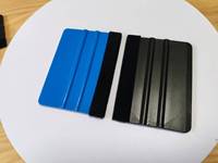 Vente chaude 10*7.4 cm grattoir en plastique souple caoutchouc bleu raclette feutre bord