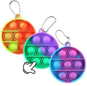 LLavero de silicona con hoyuelos para niños, juguete antiestrés sensorial de 2021 - Product Image 1