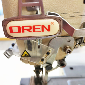 OREN Nouvelle machine à coudre industrielle à point noué à lit plat pour l'ourlet des jambes de pantalon d'enfants, haute vitesse, triple aiguille RN9200-C - Product Image 3
