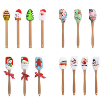 Spatule en silicone OEM pour Noël, manche en bois de hêtre, résistante à la chaleur, logo personnalisé, couleur bonhomme de neige, grattoir à gâteau, outil de pâtisserie