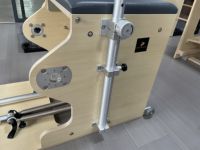 Chaise de Pilates en bois d'érable pour studio à domicile commercial, chaise Wunda avec système à ressorts