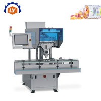 Ligne de machines de comptage, de scellage par induction, de remplissage de déshydratant, de déscramblage automatique de bouteilles entièrement automatique multi-canaux
