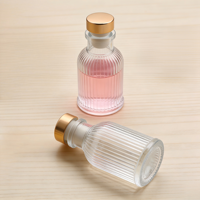 Bouteille diffuseur d'arômes en verre transparent rond vide de 50 ml avec logo personnalisé pour salle de bain