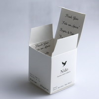 Boîte rigide en papier de coton de luxe, gaufrée or rose, pour emballage d'huile démaquillante, coffret cadeau