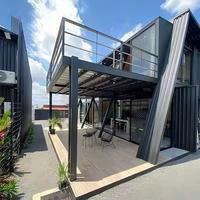 Structure métallique de carport sur mesure avec porte coulissante, maison conteneur pliable de luxe préfabriquée pour le stockage