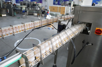 Machine de remplissage automatique de boissons (miel, eau pure) avec bouchon twist, pour bocaux métalliques 200ml et bouteilles en verre, ligne de production de boissons haute productivité, contrôlée par PLC