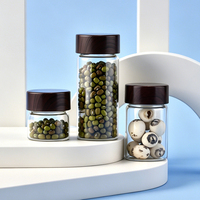 Mini-récipient cylindrique portable en verre de qualité alimentaire pour le stockage de thé, de café et de grains, avec couvercle en bois fileté