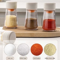 Salière moderne et minimaliste de style nouveau, distributeur de sel de cuisine en verre, pot à épices hermétique, résistant à l'humidité et compatible micro-ondes