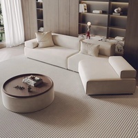 Canapé d'angle moderne en velours en forme de L à trois places avec rembourrage en éponge pour hall d'hôtel, club, salon de beauté