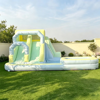 Château gonflable de luxe Macaron avec toboggan et piscine, combo commercial, couleurs pastel, pour location de fête d'anniversaire